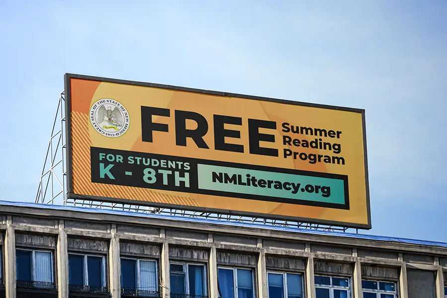 Billboard on building advertising the Free Summer Reading Program